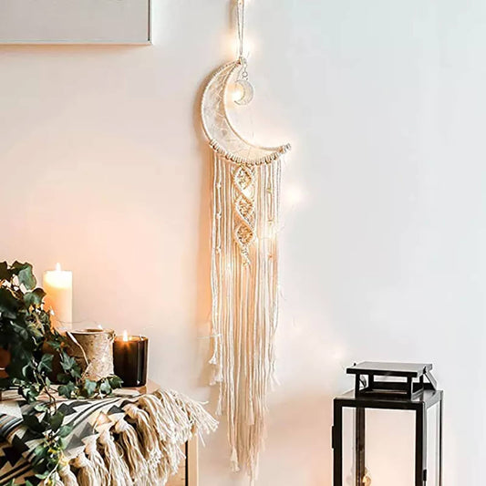 light colored macrame dream catcher moon shaped wall hanging