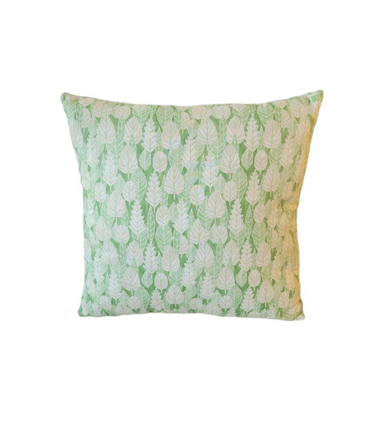 18" x 18" green throw pillow with white leaf pattern. 
